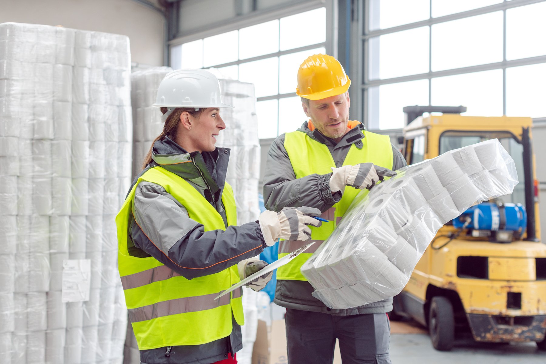 Workers in the Rental Toilet Business Checking the Paper Stock